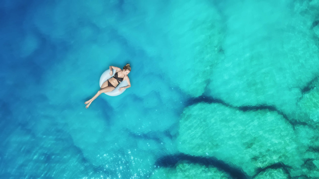 woman in bikini relaxing in the sea